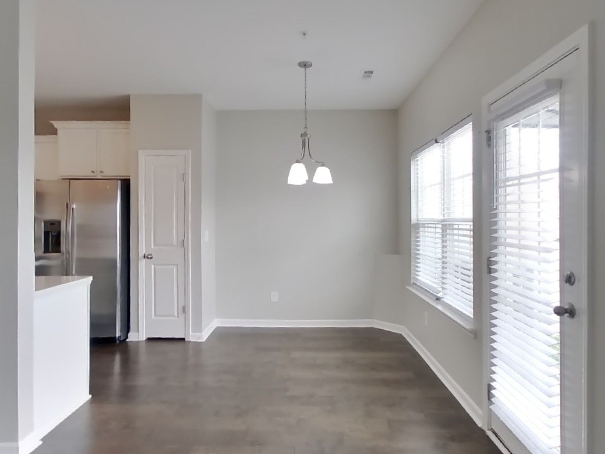 704 Finse Drive Spring Hill, TN 37174 - Photo 4 of 16 a view of a room with window and hardwood floor