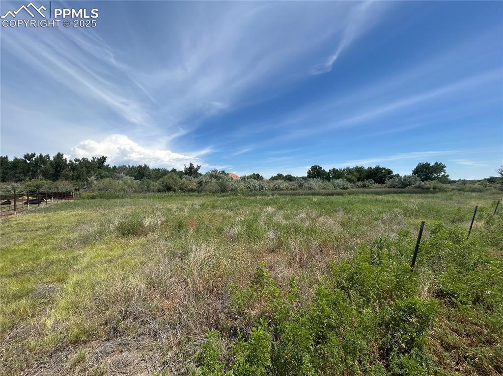 119 County Road Florence, CO 81226 - Photo 5 of 9 a view of a lake with houses in the back