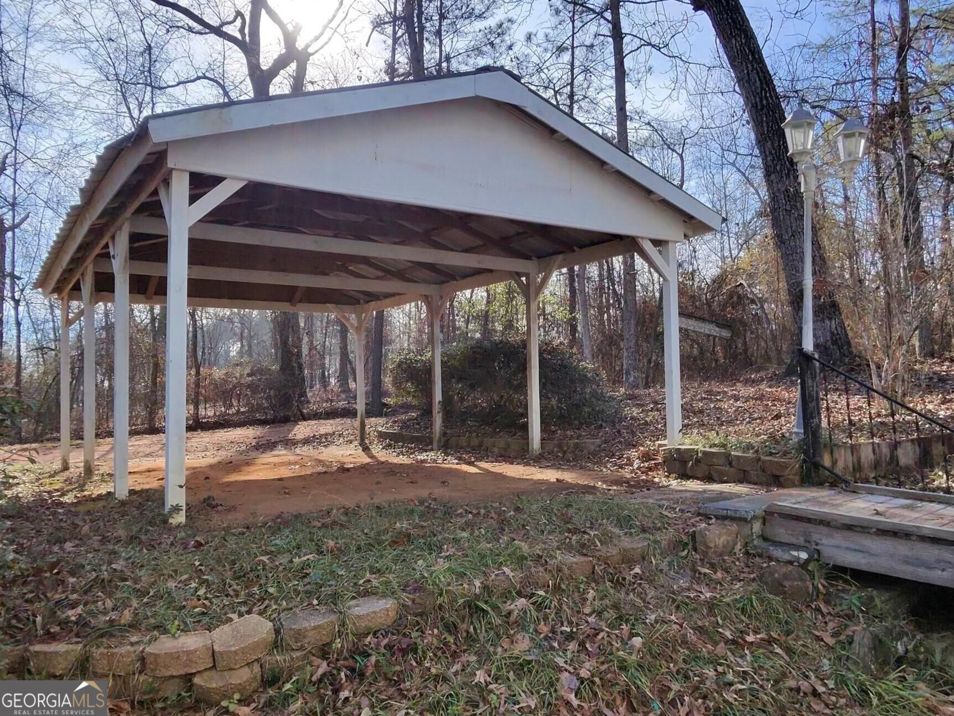 173 Preston Road Byron, GA 31008 - Photo 17 of 22 a view of a house with backyard and trees