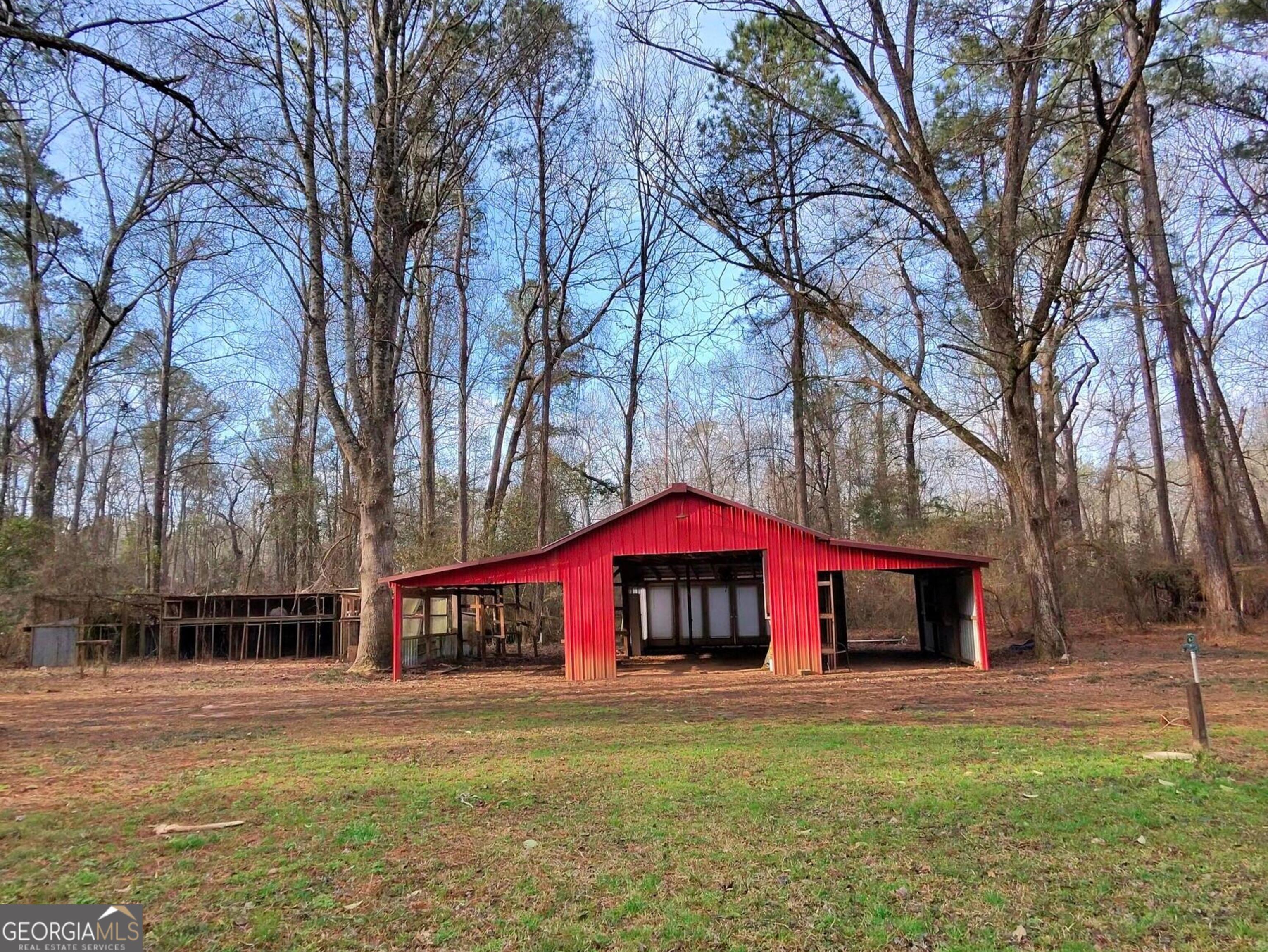173 Preston Road Byron, GA 31008 - Photo 20 of 22 a front view of houses with yard and green space