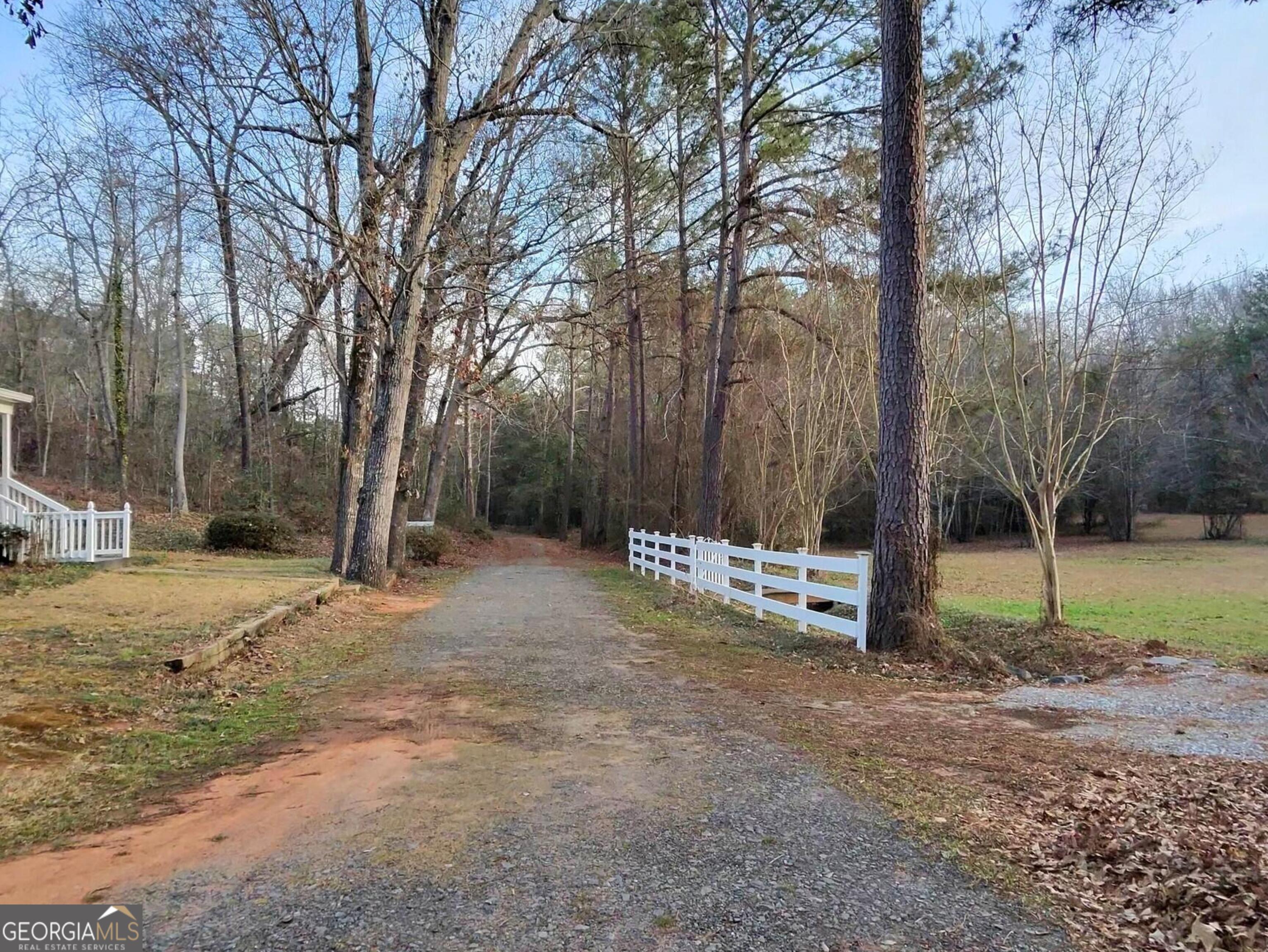 173 Preston Road Byron, GA 31008 - Photo 4 of 22 a backyard of a house with lots of green space