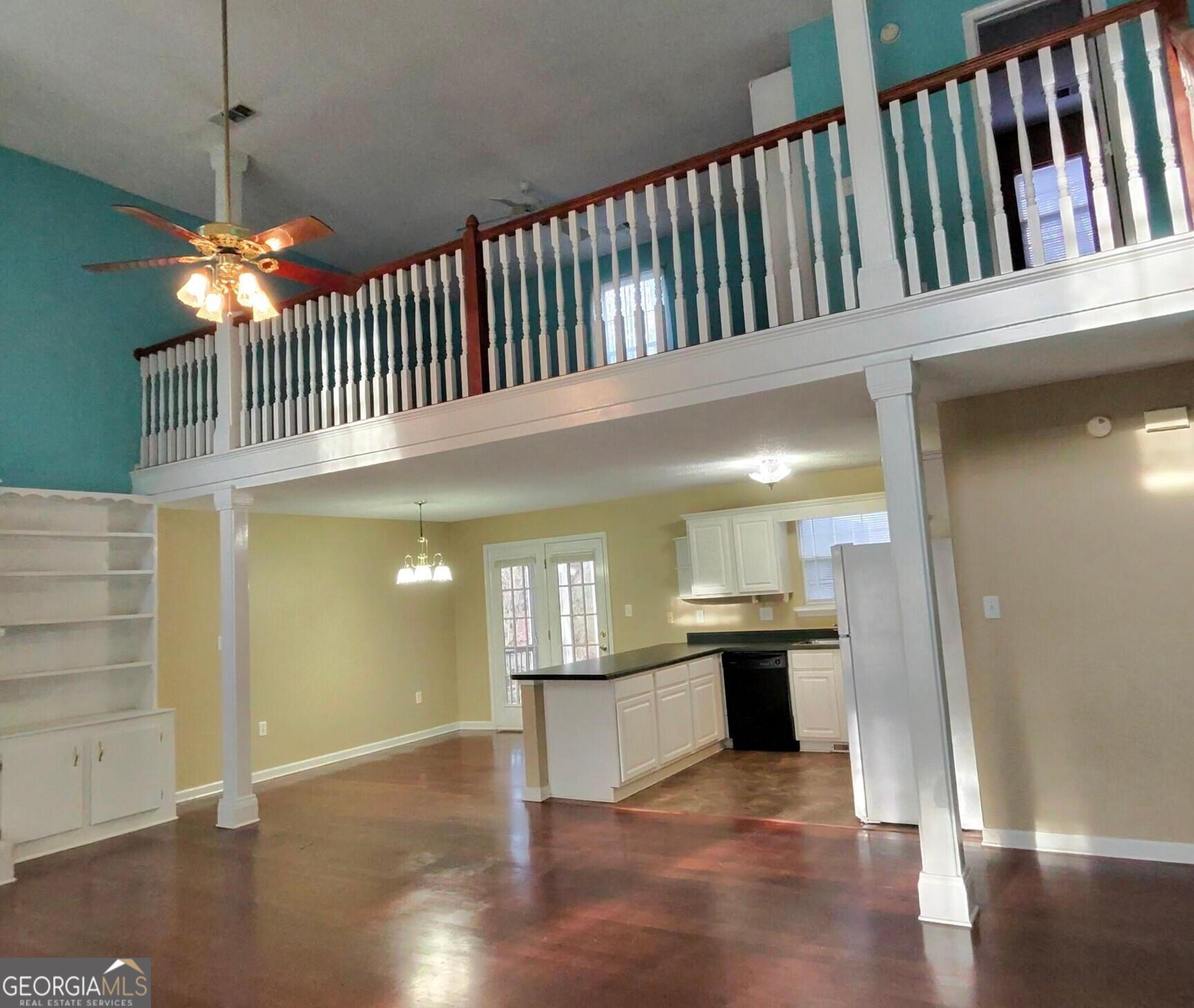 173 Preston Road Byron, GA 31008 - Photo 8 of 22 a view of a hallway with a kitchen
