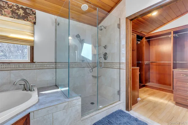 a bathroom with a sink and shower