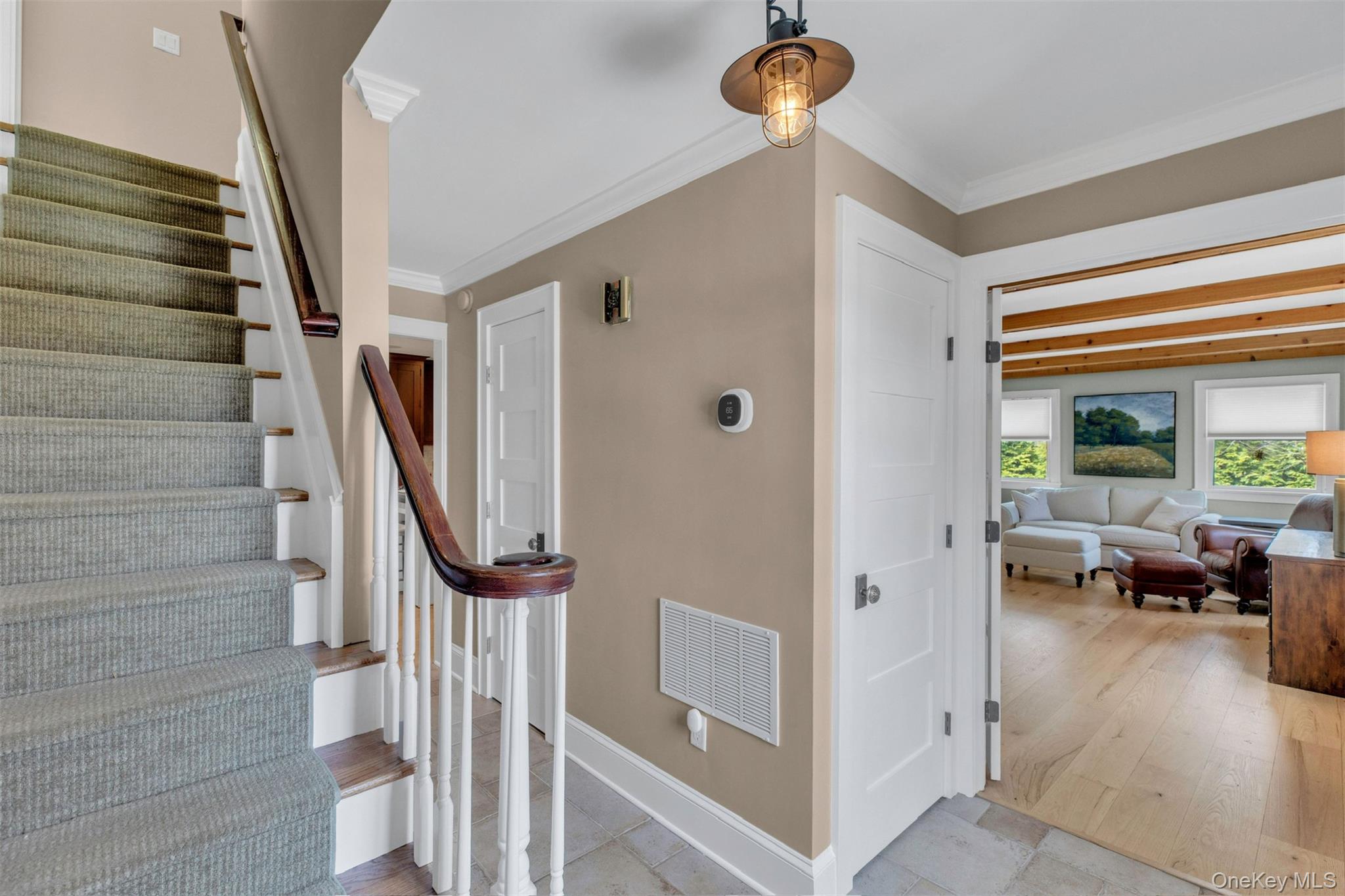 345 Colonial Road Southold, NY 11971 - Photo 4 of 31 a view of entryway and hall with wooden floor