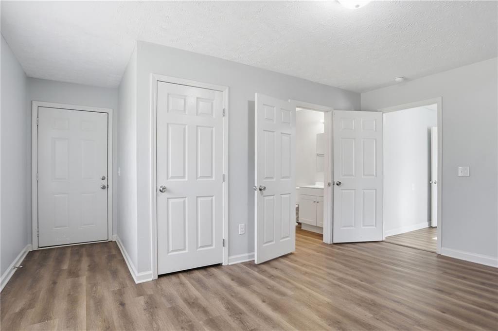 714 Reed Street Monroe, GA 30655 - Photo 19 of 31 a view of a livingroom with wooden floor