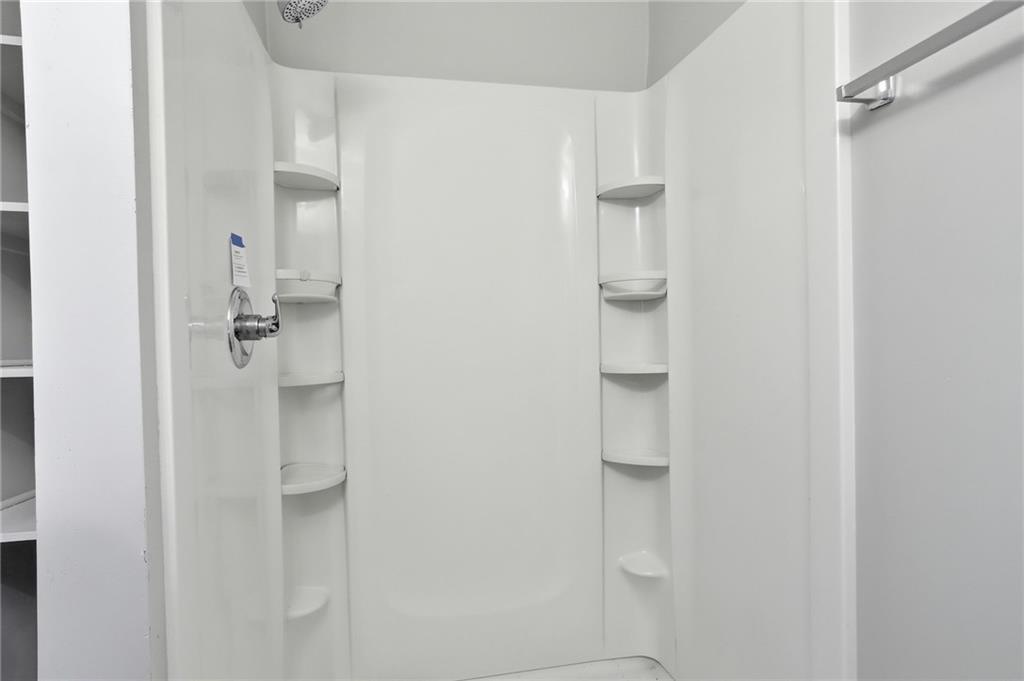 714 Reed Street Monroe, GA 30655 - Photo 23 of 31 a bathroom with a shower