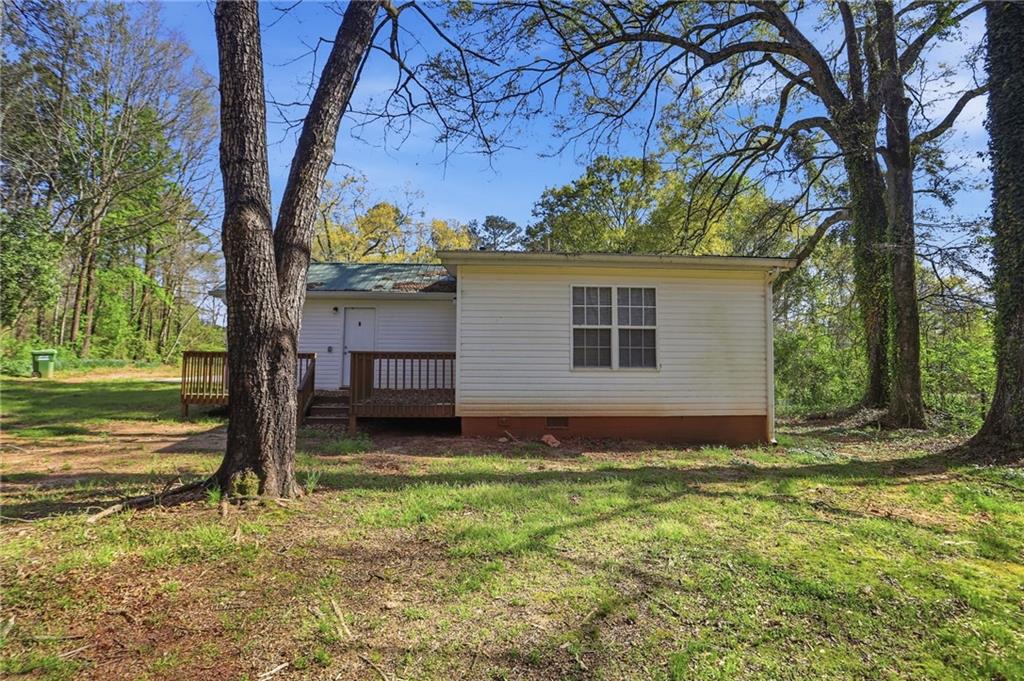 714 Reed Street Monroe, GA 30655 - Photo 28 of 31 a backyard of a house with lots of green space