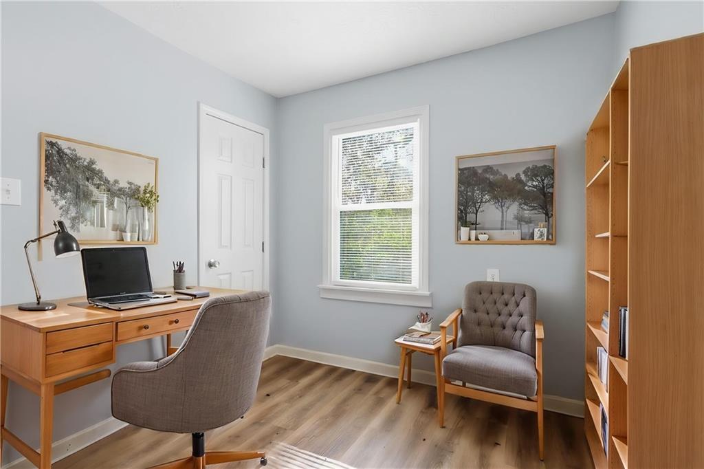 714 Reed Street Monroe, GA 30655 - Photo 6 of 31 a view of a workspace with furniture and a window