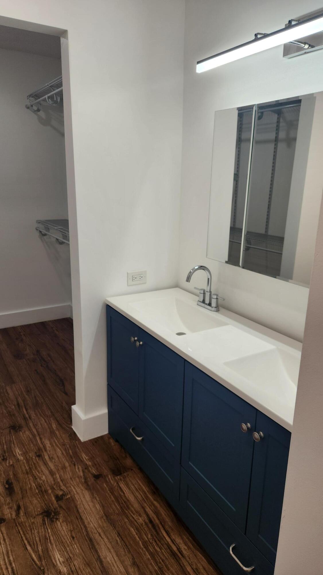 517 Dotterel Road, Unit 31C Delray Beach, FL 33444 - Photo 15 of 31 a bathroom with a sink and a mirror