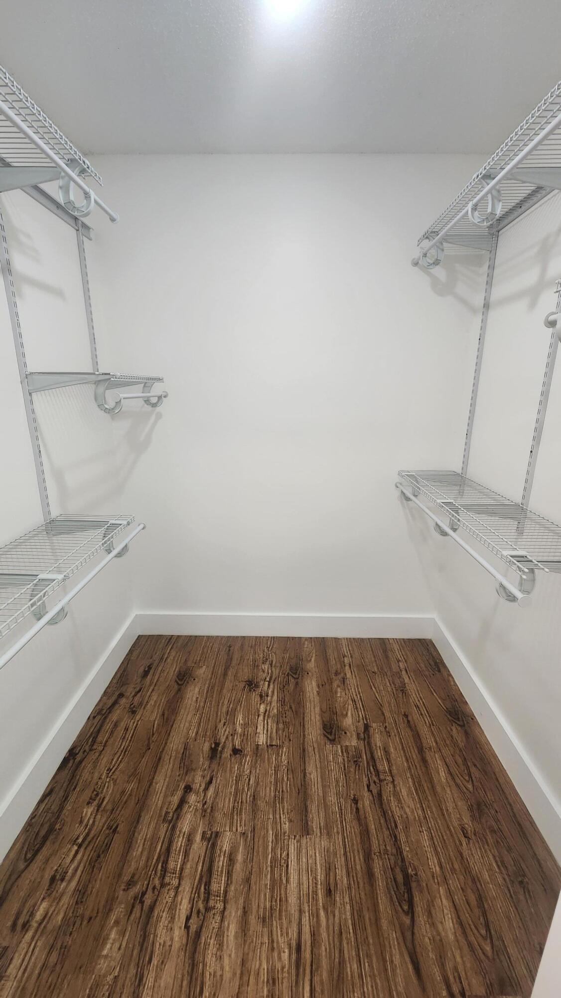 517 Dotterel Road, Unit 31C Delray Beach, FL 33444 - Photo 20 of 31 a view of a room with wooden floor