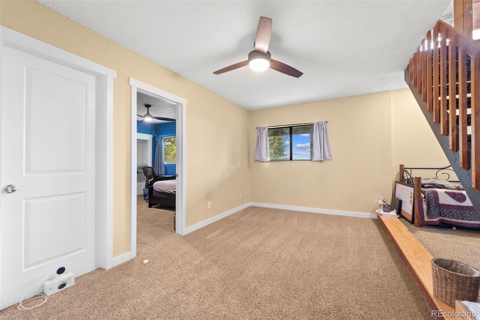 10829 Bartlett Trail Rye, CO 81069 - Photo 22 of 40 a view of livingroom with furniture and workspace