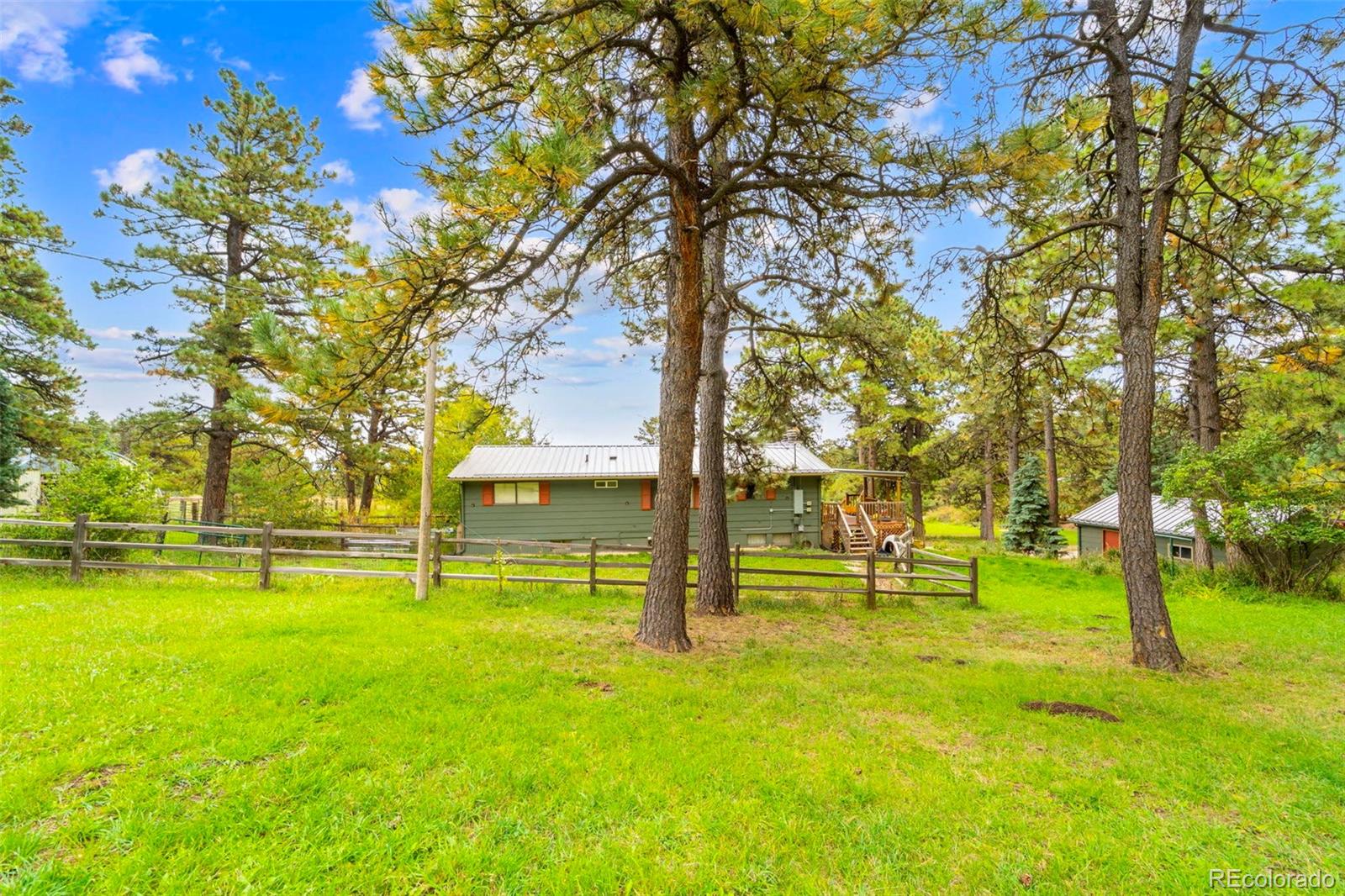 10829 Bartlett Trail Rye, CO 81069 - Photo 29 of 40 a view of yard with swimming pool and trees