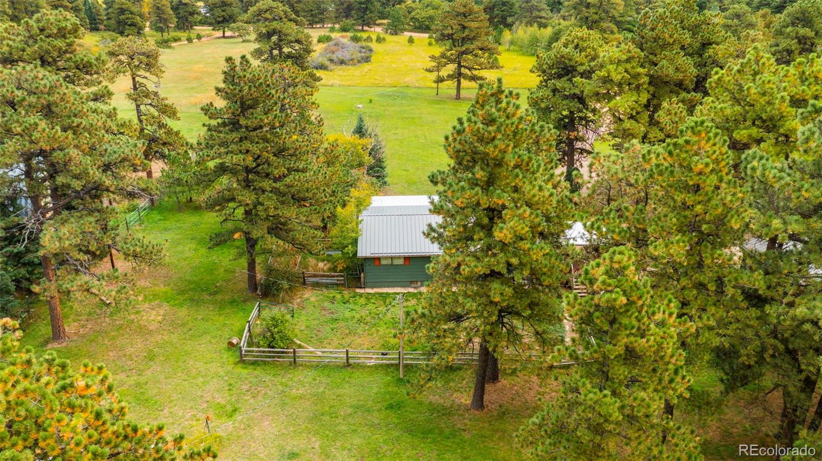 10829 Bartlett Trail Rye, CO 81069 - Photo 37 of 40 a view of a yard with swimming pool