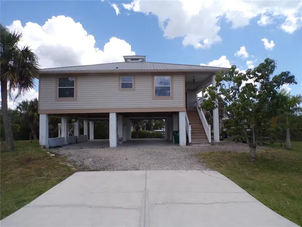 a view of a house with a patio