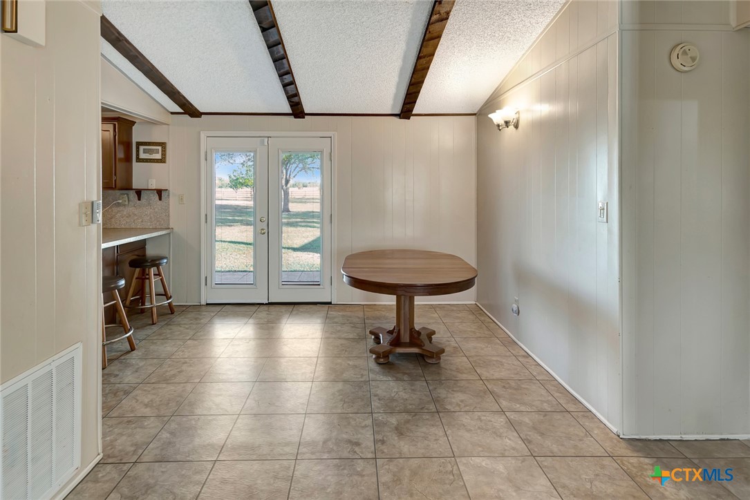 293 County Road 406 Edna, TX 77957 - Photo 15 of 48 a view of a room with gym equipment and a rug
