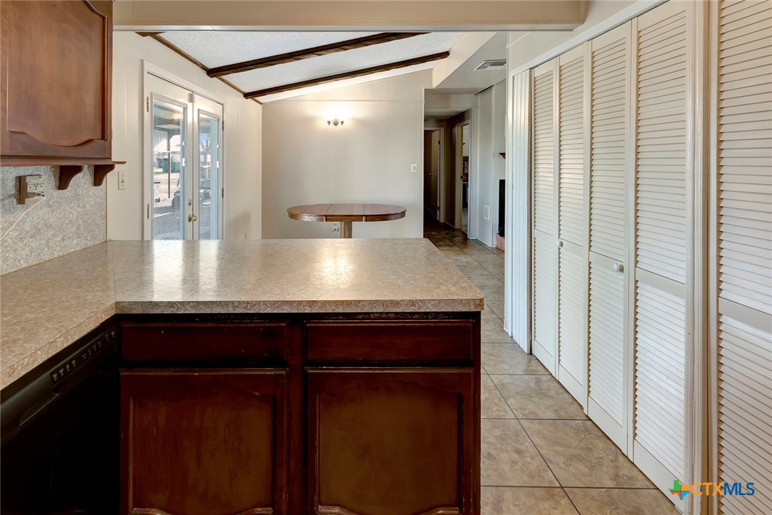 293 County Road 406 Edna, TX 77957 - Photo 21 of 48 a view of kitchen with stainless steel appliances granite countertop a sink and a refrigerator