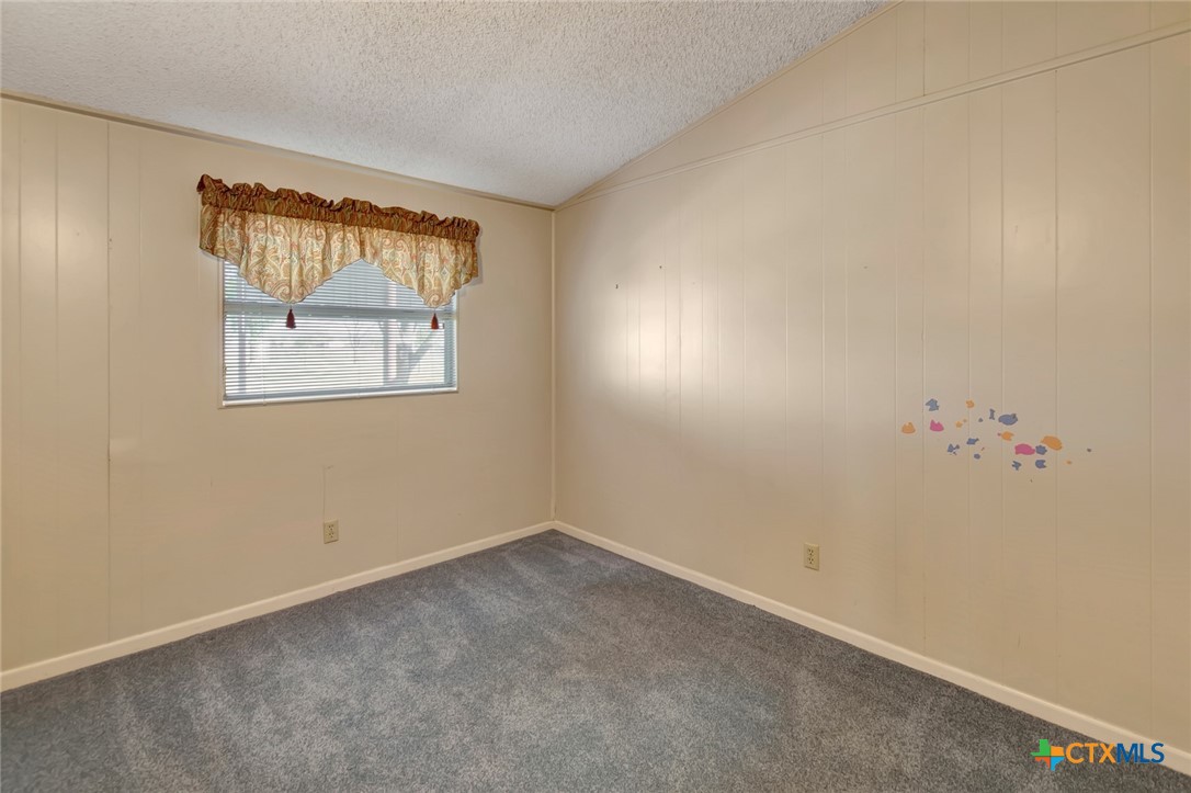 293 County Road 406 Edna, TX 77957 - Photo 34 of 48 an empty room with a window