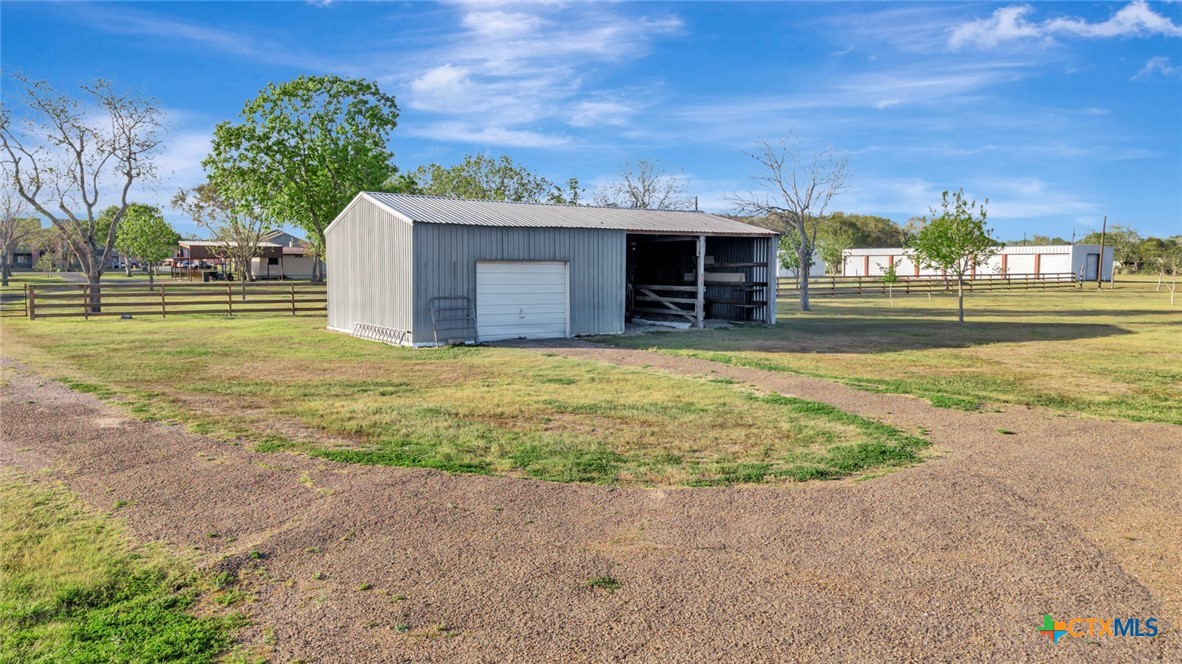 293 County Road 406 Edna, TX 77957 - Photo 44 of 48 a view of a house with a yard