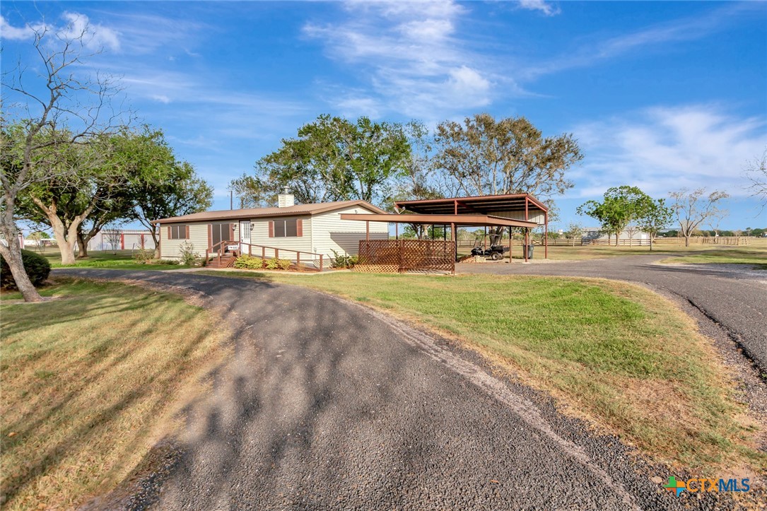 293 County Road 406 Edna, TX 77957 - Photo 6 of 48 a view of a house with a yard