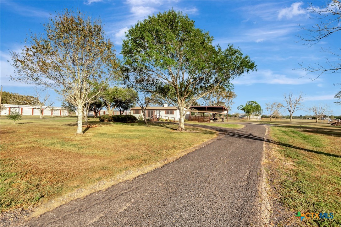 293 County Road 406 Edna, TX 77957 - Photo 7 of 48 a view of swimming pool with outdoor seating