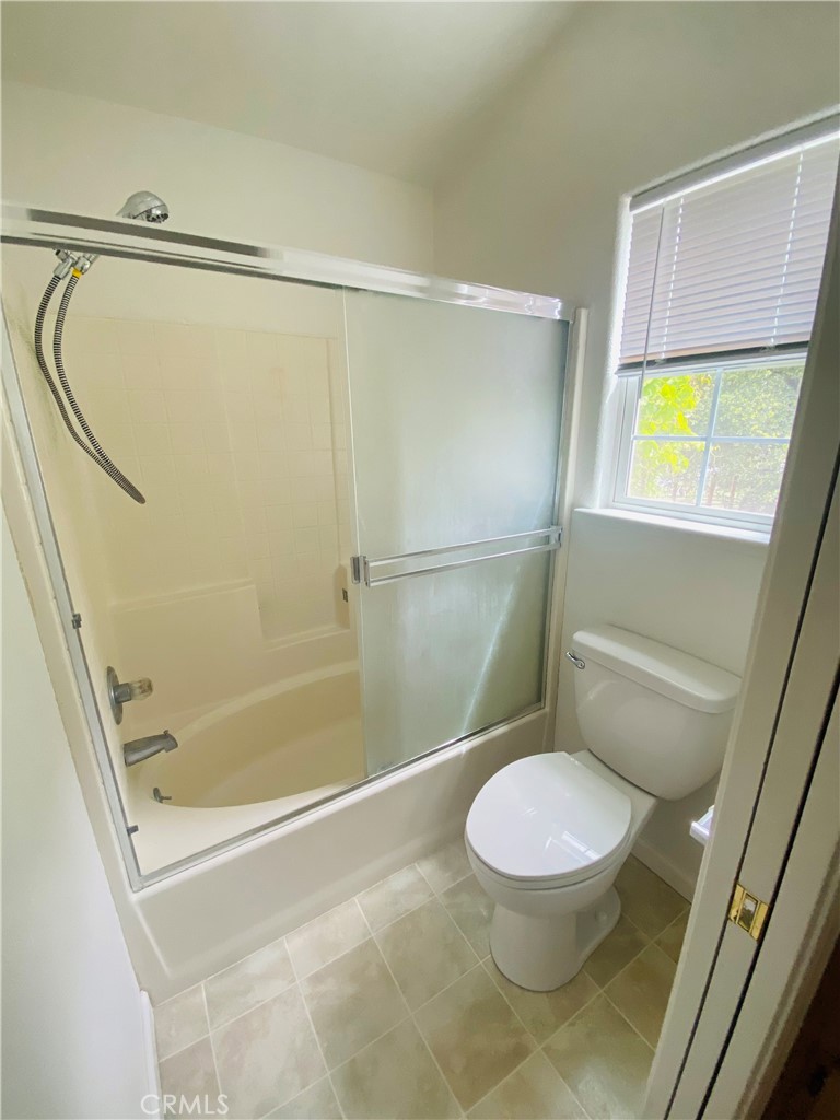 16506 Ridgecrest Court Hidden Valley Lake, CA 95467 - Photo 13 of 25 a bathroom with a toilet and a shower