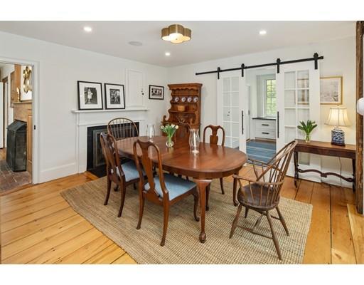 451 Main Street Hingham, MA 02043 - Photo 15 of 35 a view of a dining room with furniture and chandelier