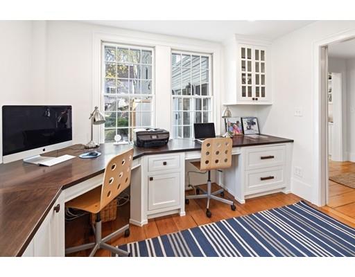 451 Main Street Hingham, MA 02043 - Photo 19 of 35 a room with furniture a flat screen tv and a floor