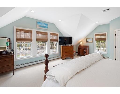 451 Main Street Hingham, MA 02043 - Photo 21 of 35 a bedroom with furniture and a flat screen tv