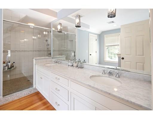 451 Main Street Hingham, MA 02043 - Photo 22 of 35 a bathroom with a granite countertop sink mirror and