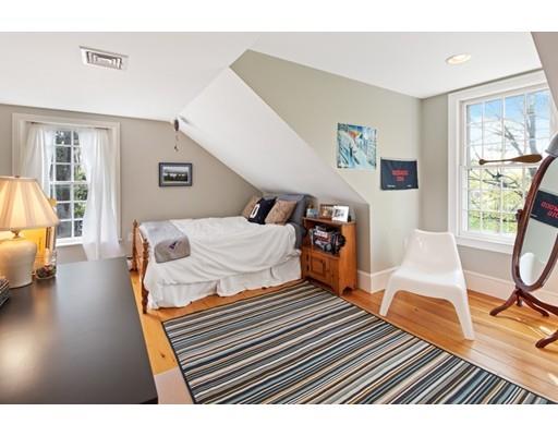 451 Main Street Hingham, MA 02043 - Photo 23 of 35 a bedroom with a bed and wooden floor