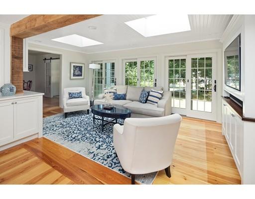 451 Main Street Hingham, MA 02043 - Photo 28 of 35 a living room with furniture and a large window