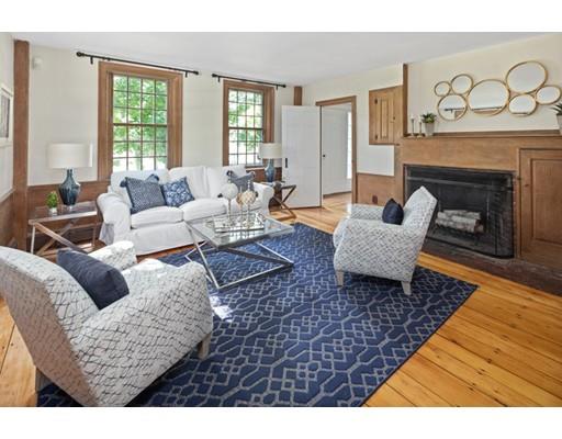 451 Main Street Hingham, MA 02043 - Photo 31 of 35 a living room with furniture and a fireplace