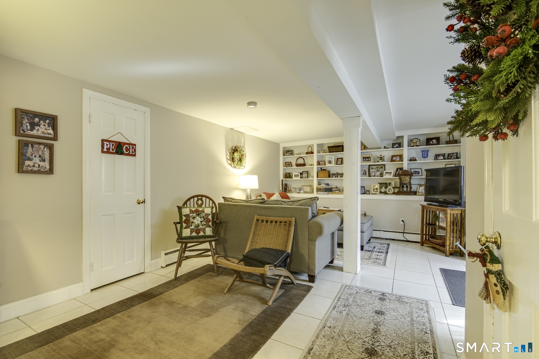 183 Sugar Street Newtown, CT 06470 - Photo 22 of 40 a workspace with furniture and window