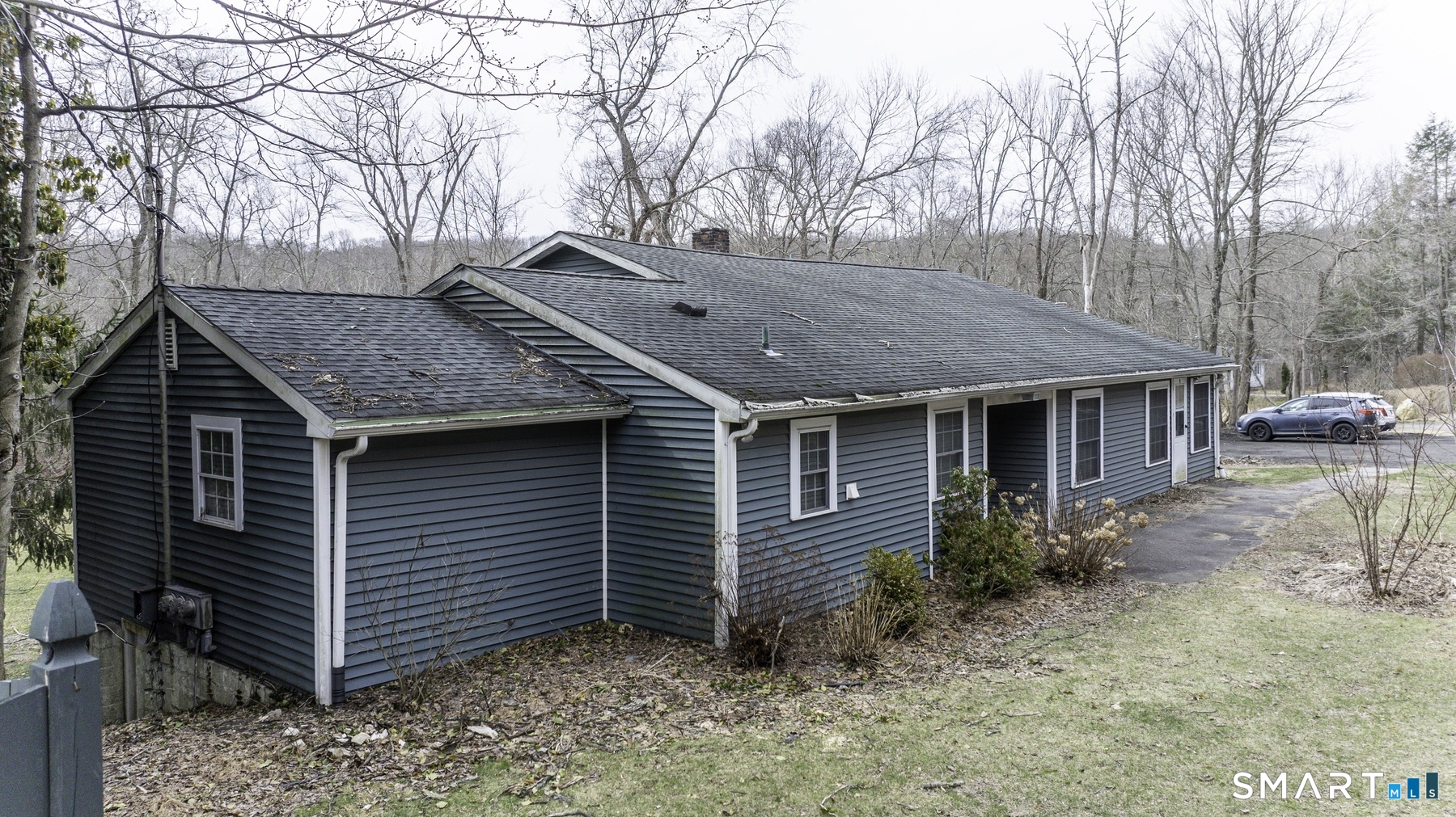 183 Sugar Street Newtown, CT 06470 - Photo 30 of 40 a view of a house with a yard
