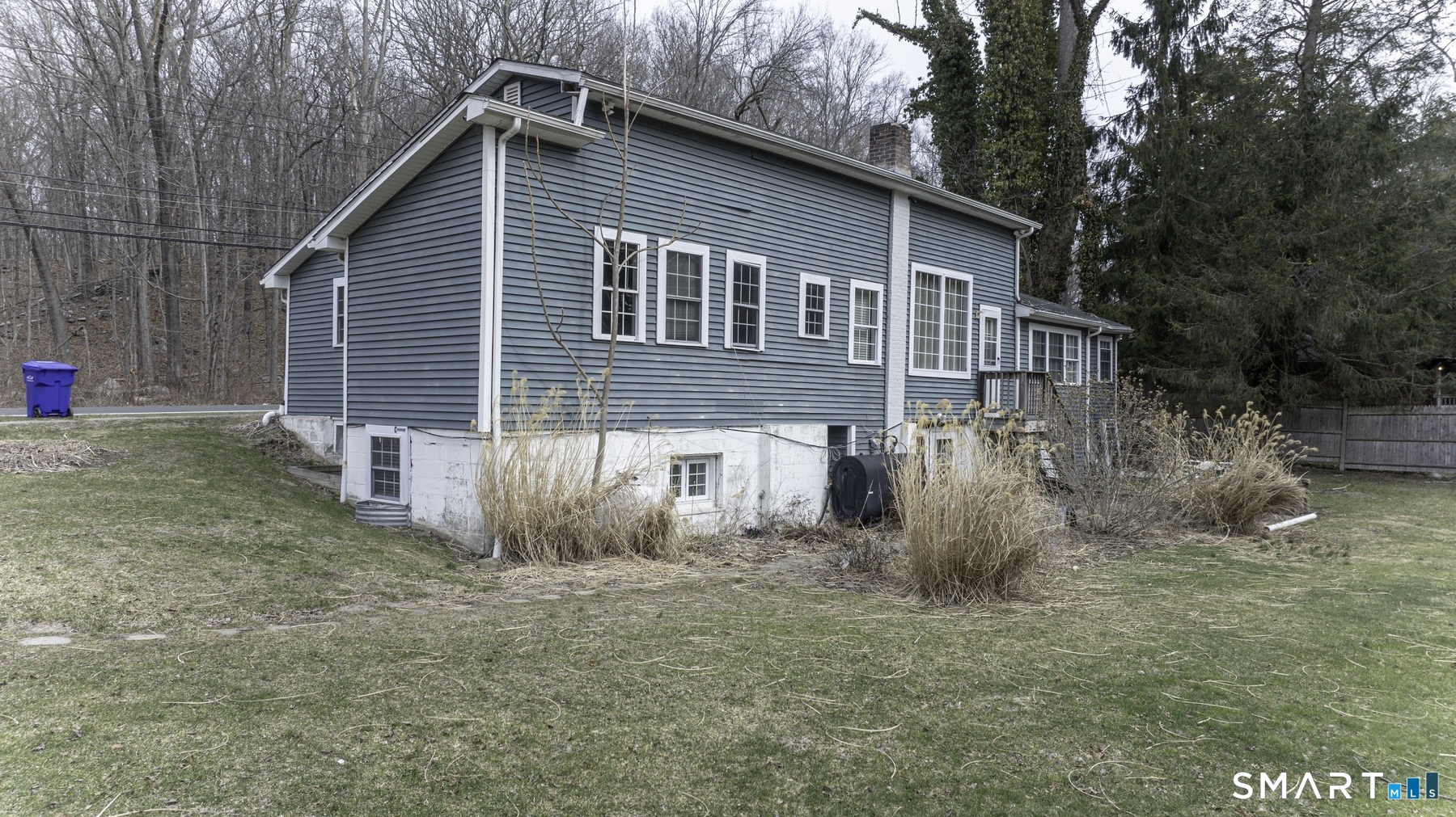 183 Sugar Street Newtown, CT 06470 - Photo 34 of 40 a view of a house with a yard