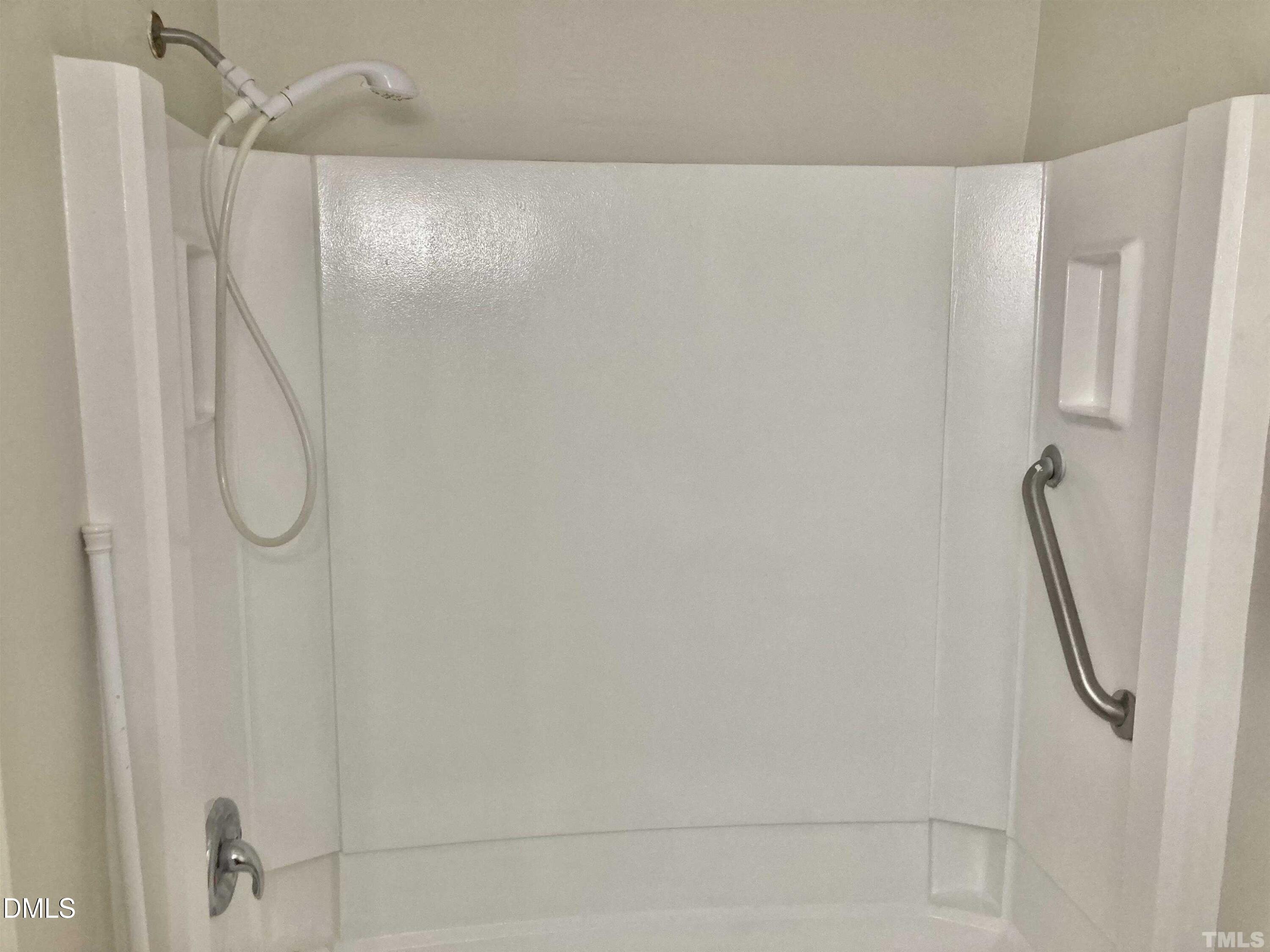 104 Castill Place Garner, NC 27529 - Photo 6 of 11 a bathroom with a shower