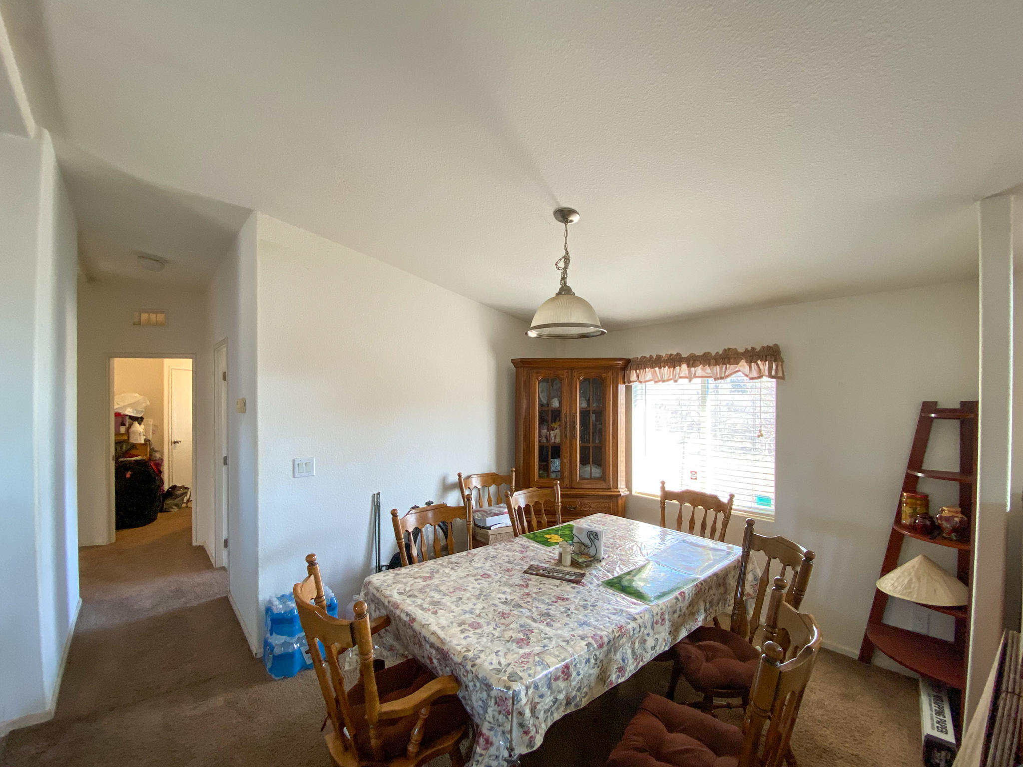 31668 Grindley Ranch Road Whitmore, CA 96096 - Photo 19 of 26 a view of a dining room with furniture window and wooden floor
