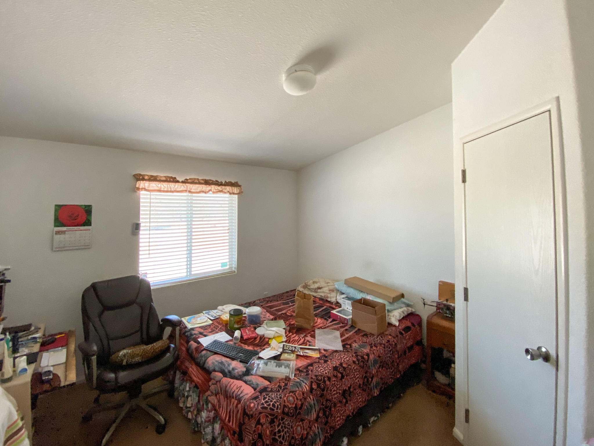 31668 Grindley Ranch Road Whitmore, CA 96096 - Photo 25 of 26 a bedroom with a bed and a window