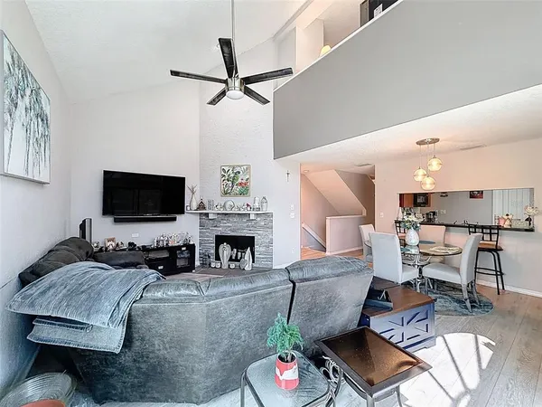 a view of a patio with a table and chairs