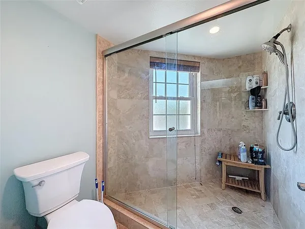 a view of a workspace with furniture and closet