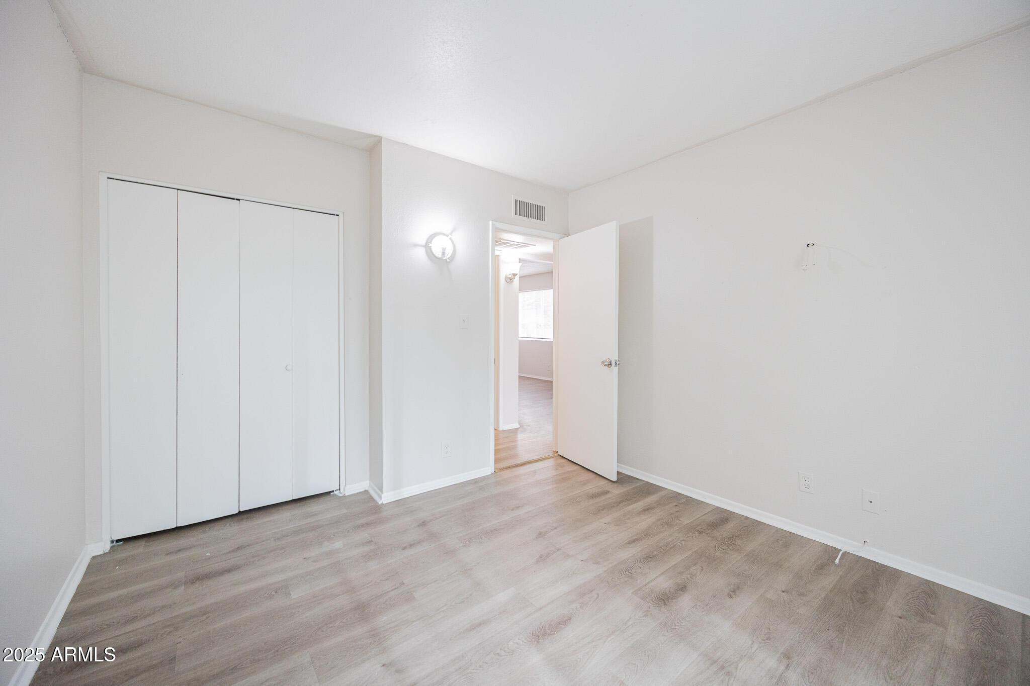 2352 East Broadway Road, Unit A Mesa, AZ 85204 - Photo 11 of 14 a view of an empty room