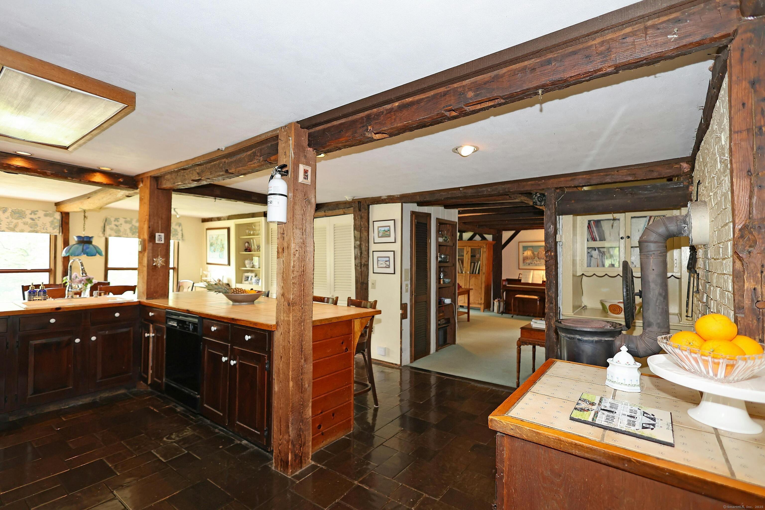 252 Florida Hill Road Ridgefield, CT 06877 - Photo 20 of 40 a large kitchen with kitchen island granite countertop a large window and counter space