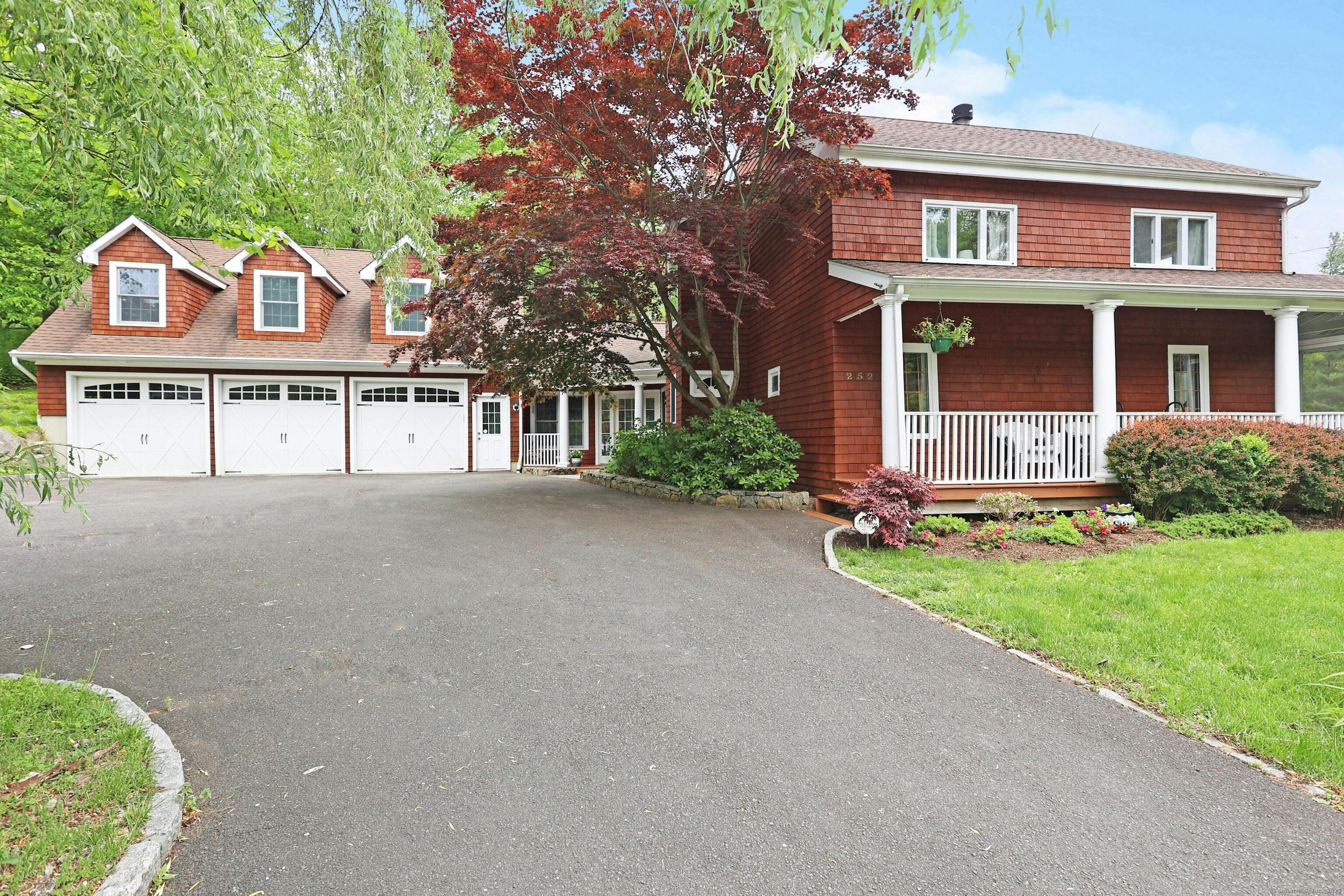 252 Florida Hill Road Ridgefield, CT 06877 - Photo 2 of 40 front view of a house with a yard