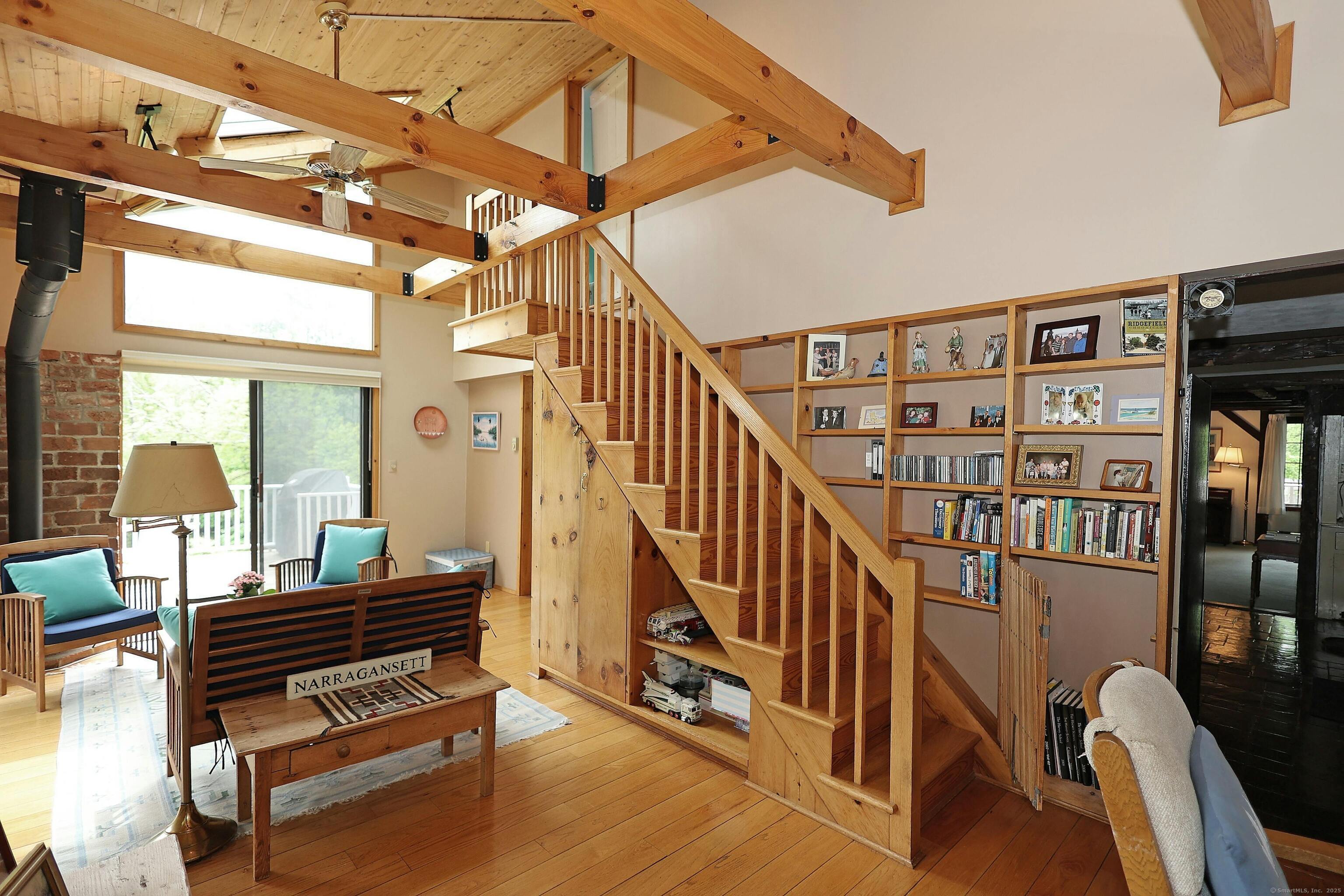 252 Florida Hill Road Ridgefield, CT 06877 - Photo 26 of 40 a view of hallway with stairs and wooden floor