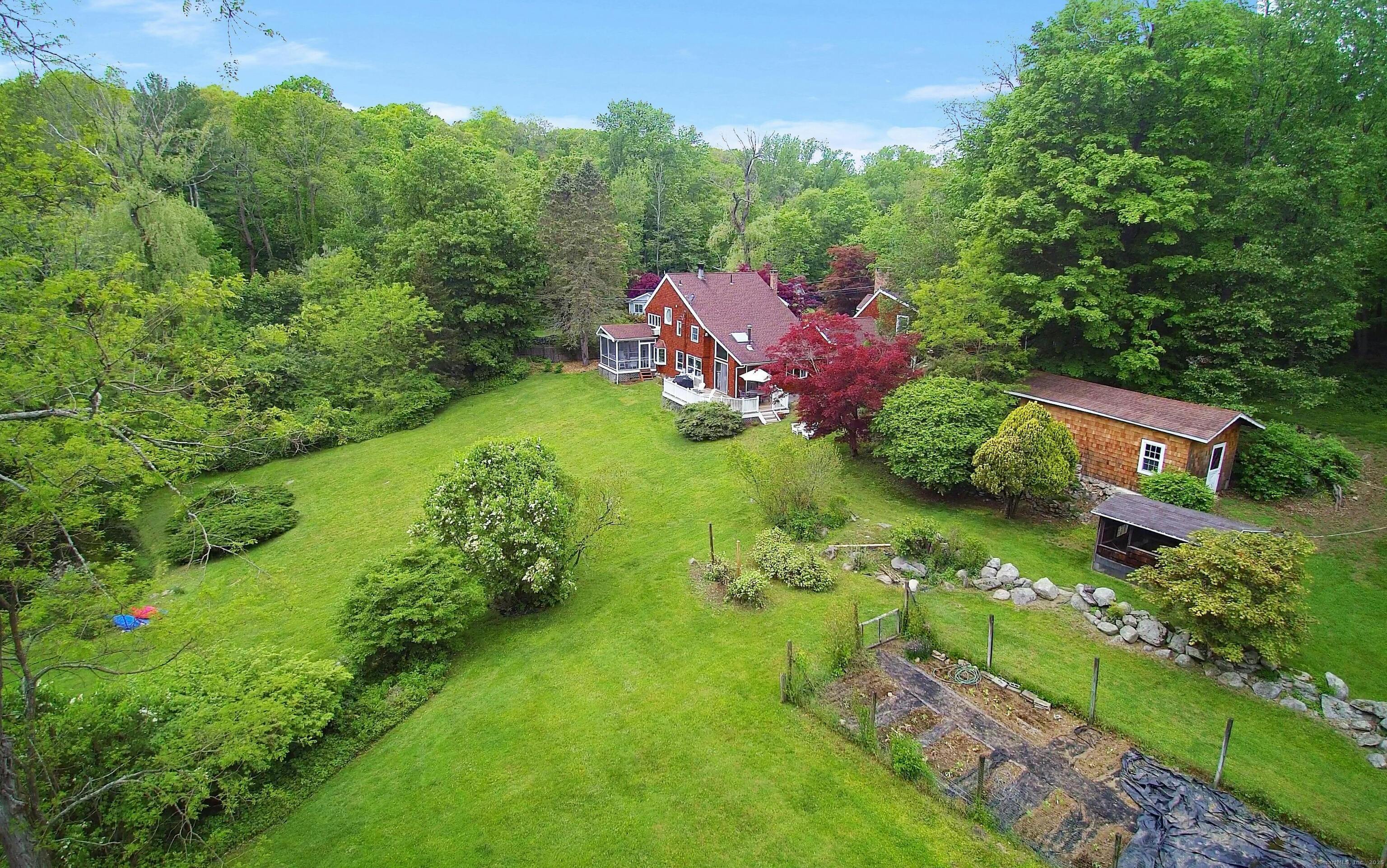252 Florida Hill Road Ridgefield, CT 06877 - Photo 37 of 40 an aerial view of a house with a yard