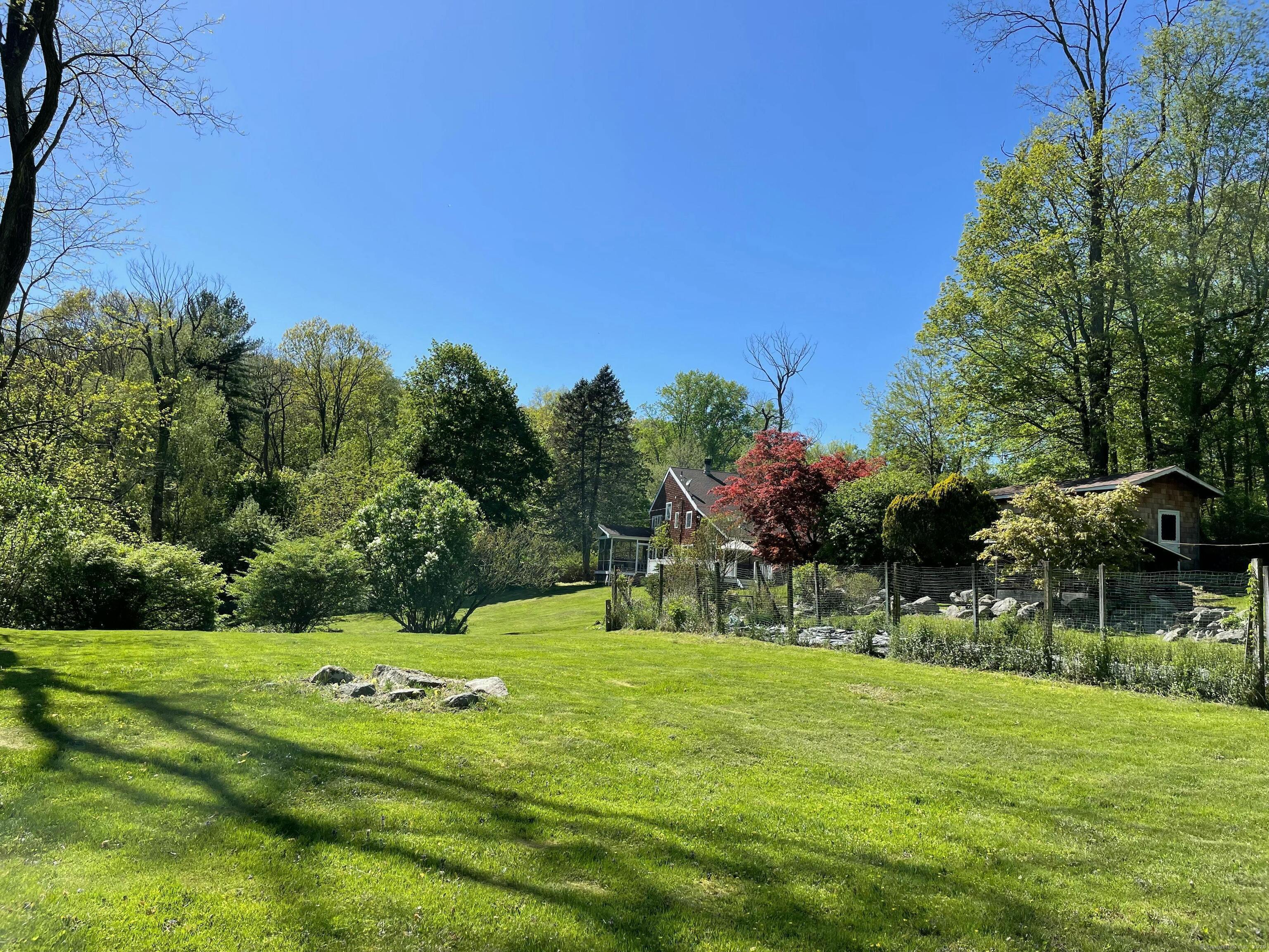 252 Florida Hill Road Ridgefield, CT 06877 - Photo 5 of 40 a view of building with garden