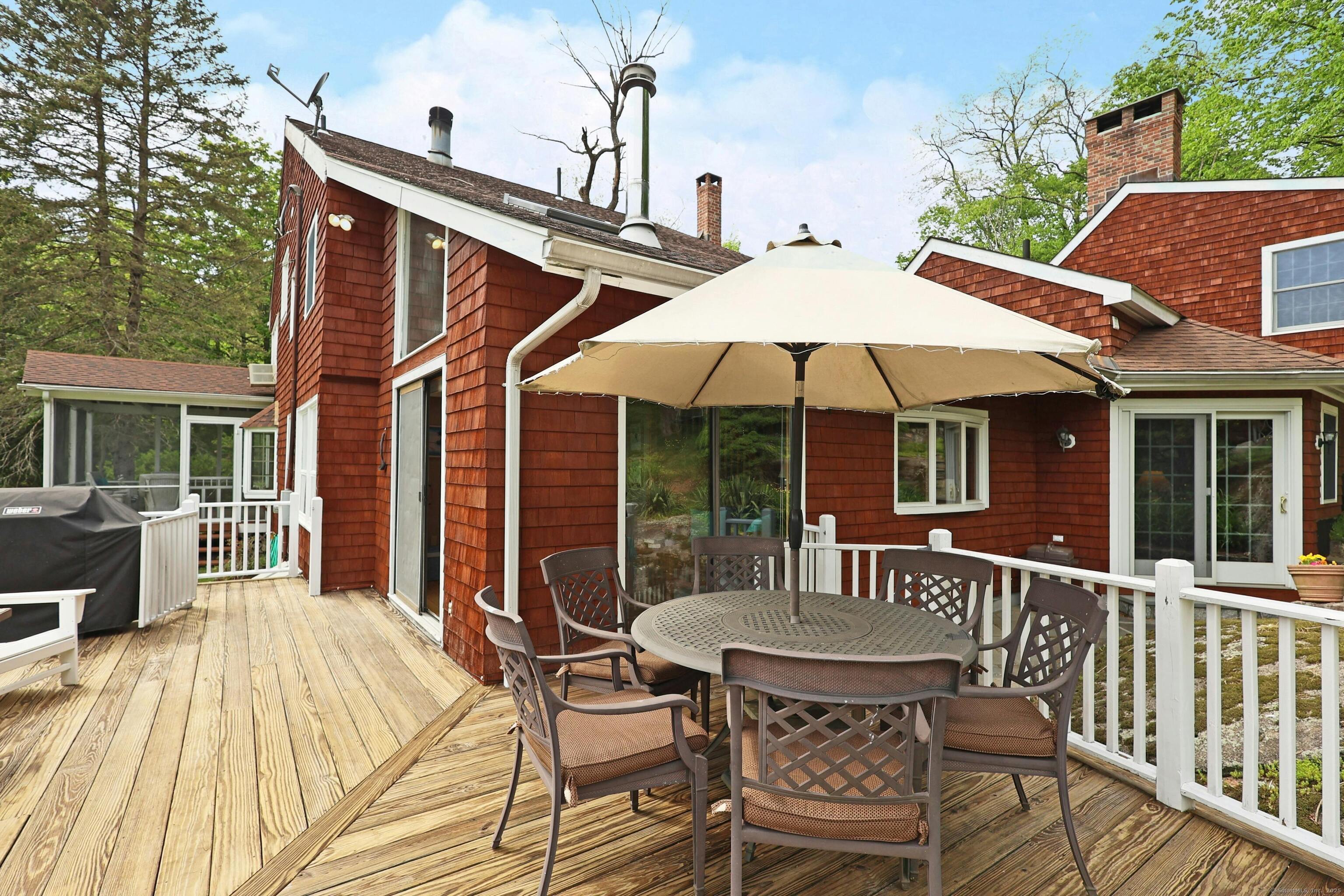 252 Florida Hill Road Ridgefield, CT 06877 - Photo 7 of 40 a view of a house with backyard and sitting area