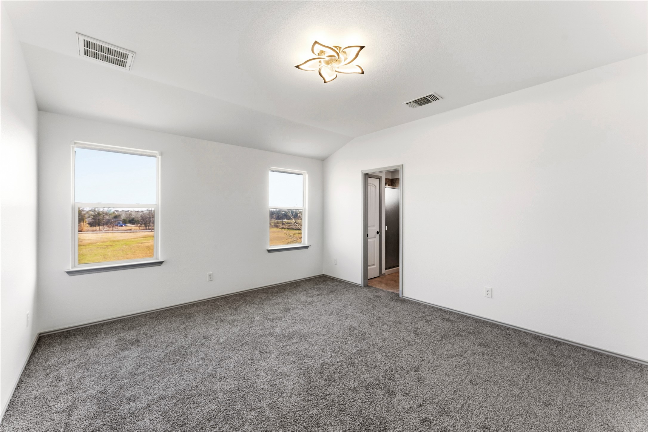 100 Serpentine Lane Jarrell, TX 76537 - Photo 25 of 40 a view of an empty room with a window