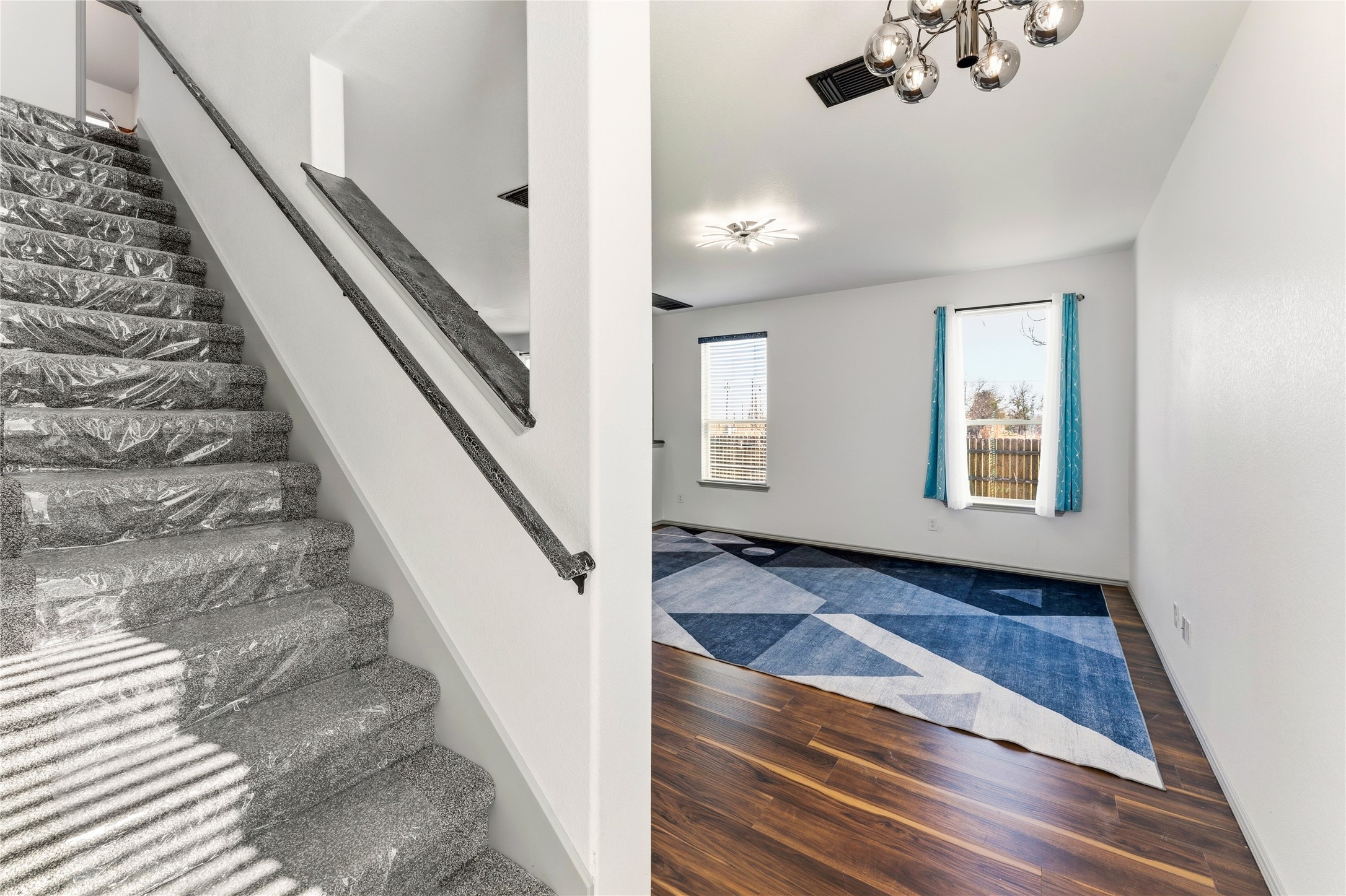 100 Serpentine Lane Jarrell, TX 76537 - Photo 6 of 40 a view of an entryway with wooden floor