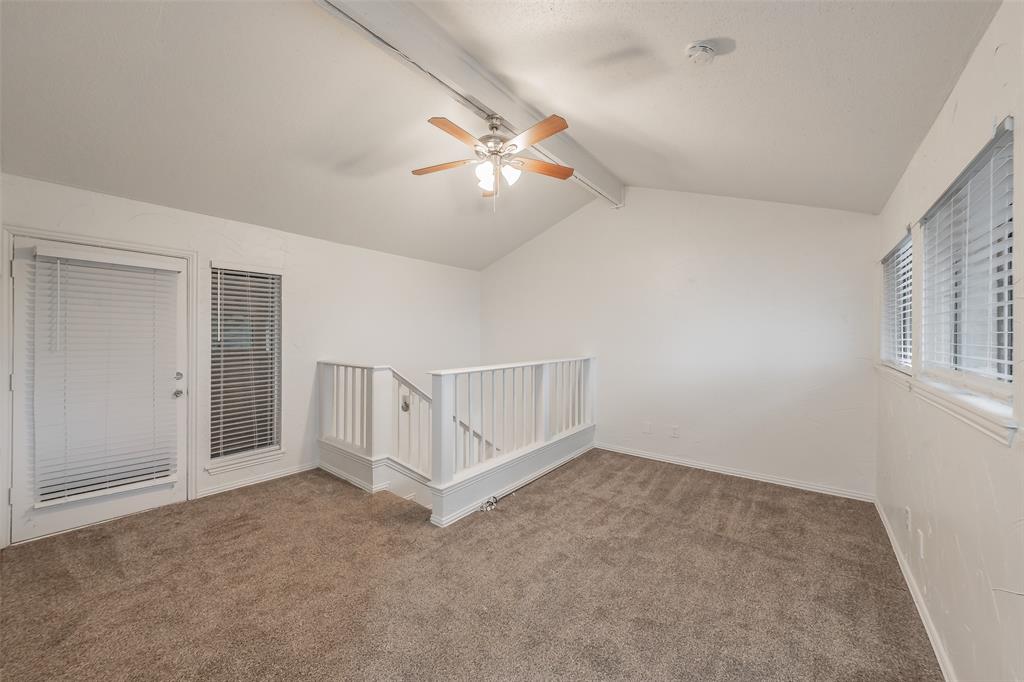 9999 Boat Club Road, Unit 311 Fort Worth, TX 76179 - Photo 22 of 25 a view of an empty room with a ceiling fan